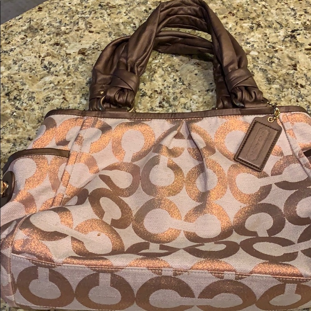 Lovely Rose Gold Coach bag